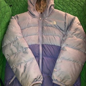 North Face purple/lilac Girls winter jacket. Small red marker stain on sleeve.